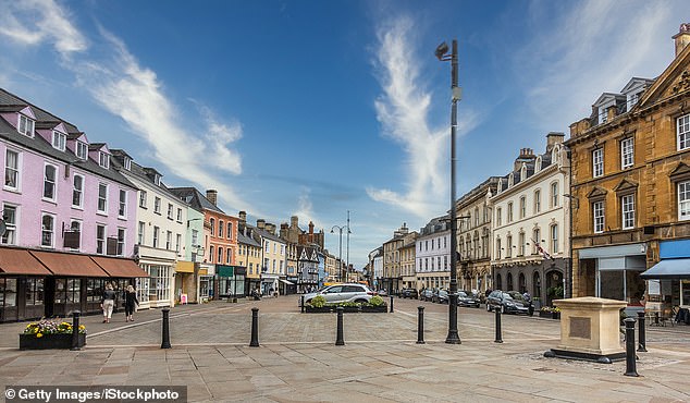 Local councilor Sandra Smith, who lives in the 'Cotswolds capital' of Cirencester (pictured above), said she only planned on moving to the area for two years back in the eighties, but she fell in love with the 'tiny houses and cars' and 'sense of community'