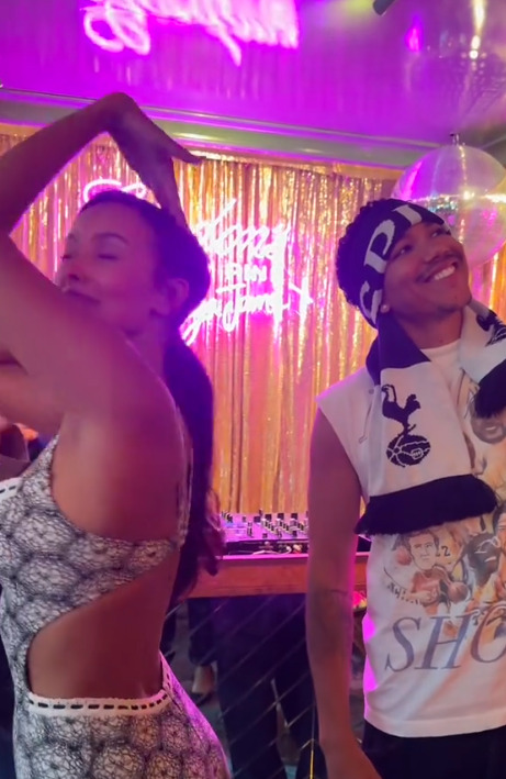 Maya Jama and a man at a party.