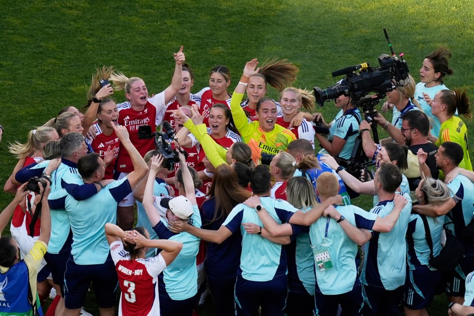 Arsenal women's soccer team celebrating a victory.