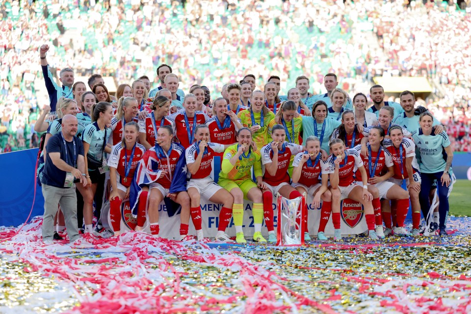 Arsenal women's football team celebrates their UEFA Women's Champions League victory.