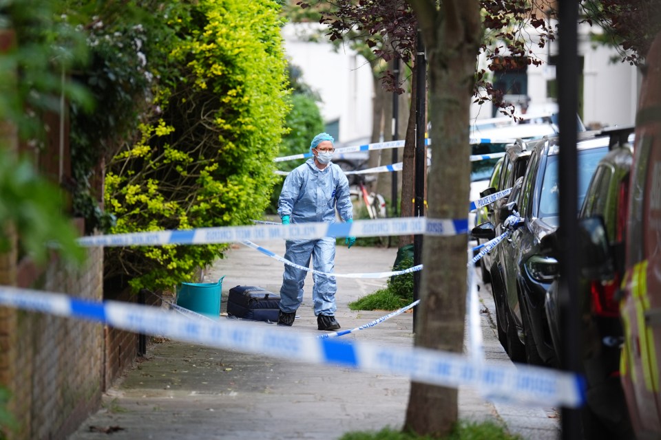 Forensics officer at a crime scene.