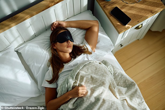 He said sleeping on your stomach adds 'repeated pressure on the skin,' which can 'contribute to wrinkle formation over time.' That's why he said it's vital to rest on your back (stock image)