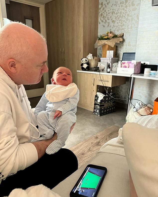 Pictured: Hirst with his son Noah