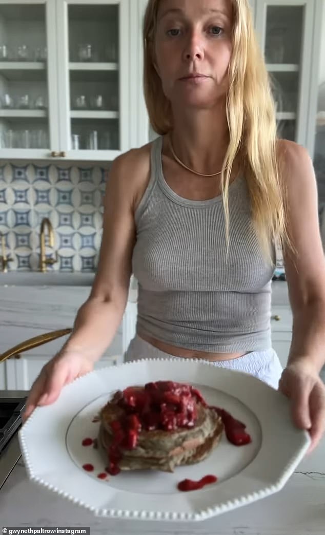 The clip concluded with her stacking the freshly made pancakes onto a plate - which were then topped with the warm strawberry compote