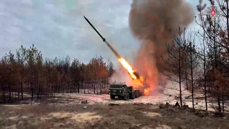 Russian self-propelled multiple rocket launcher firing.