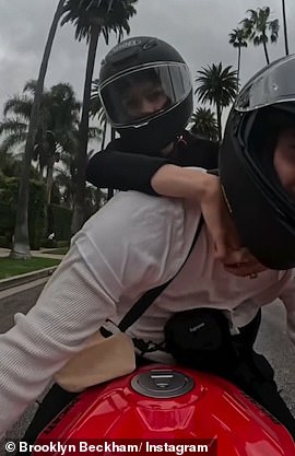 In the video they cruised around on the motorbike as Nicola put his arms around Brooklyn and held on