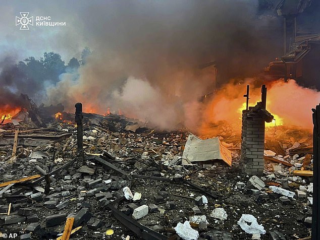 In this photo provided by the Ukrainian Emergency Service, private houses are seen ruined after a Russian drones attack in Kyiv region, Ukraine