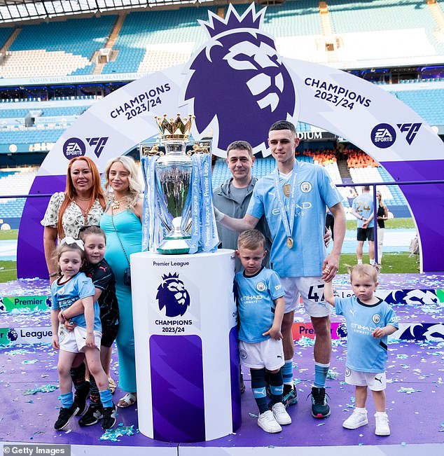 Foden and his family with the Premier League trophy on May 19, 2024