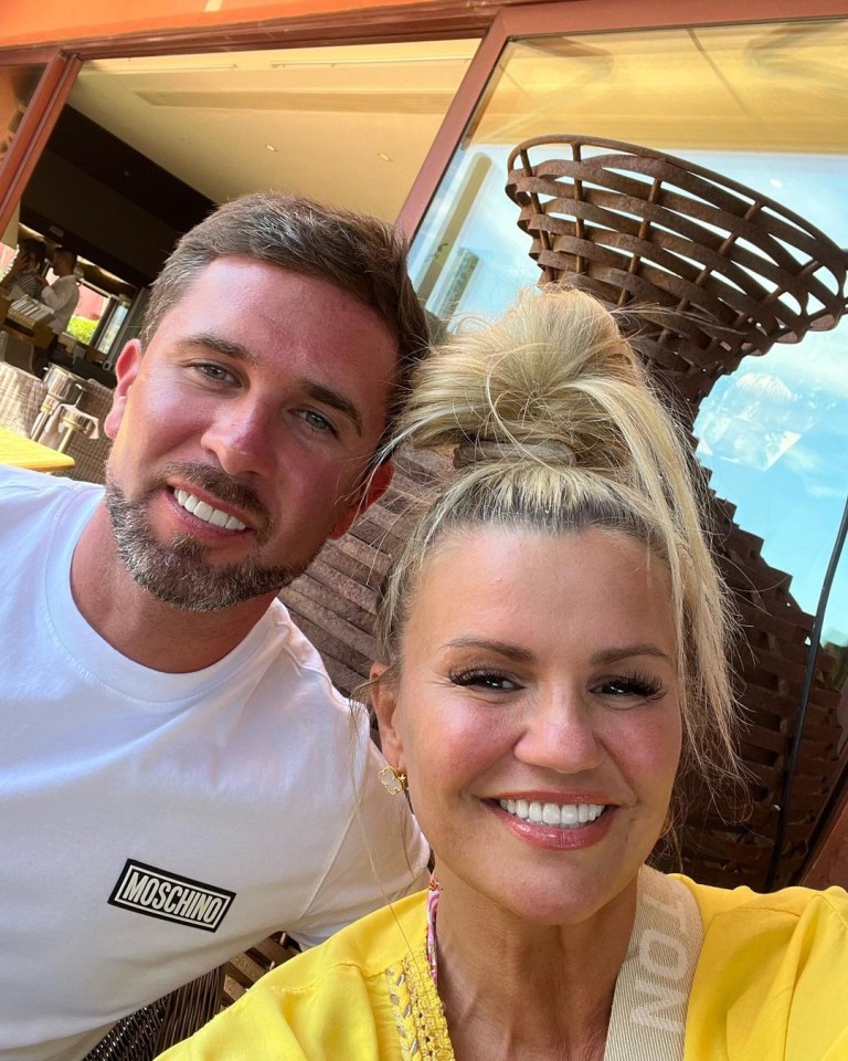 Kerry Katona and Ryan Mahoney smiling for a selfie.