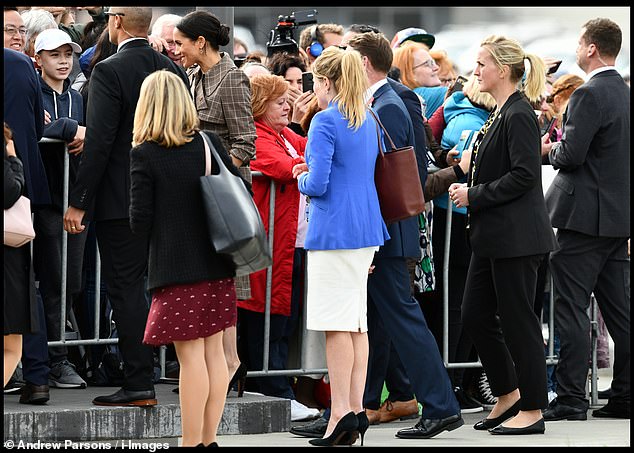 Harry and Meghan with their royal aides close by. With rumours growing about Harry and Meghan's treatment of royal staff, the tour would become the high point in the public's perception of the couple as they faced an 'avalanche of stories leaked to the press'