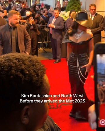 Kim Kardashian was caught scolding a security guard after he caused her to take an awkward tumble as she headed into the Met Gala earlier this month