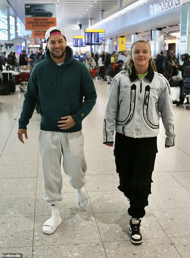 Despite her long flight JoJo looked in great spirits at Heathrow