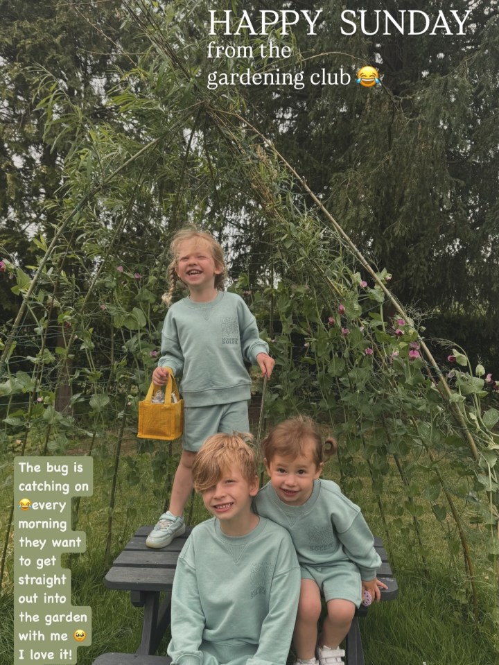 Three children gardening.