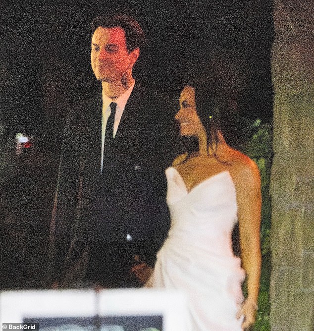 The pair appeared to be participating in a practice run of the ceremony, which is typically held the day before the wedding, with the rest of their wedding party