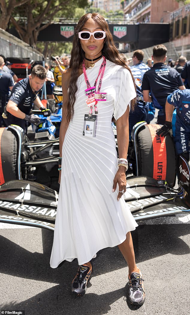 Supermodel Naomi Campbell donned a ruffled, one-shoulder white midi dress at the event on Sunday. She paired the frock with some bright, white sunglasses and black sneakers, and the combination just didn't work