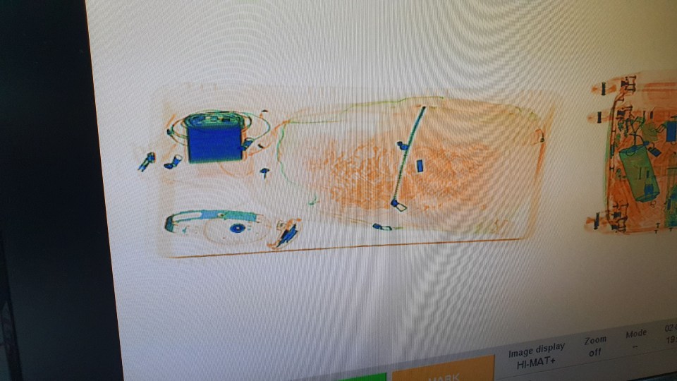 X-ray image of cocaine hidden in a passport.