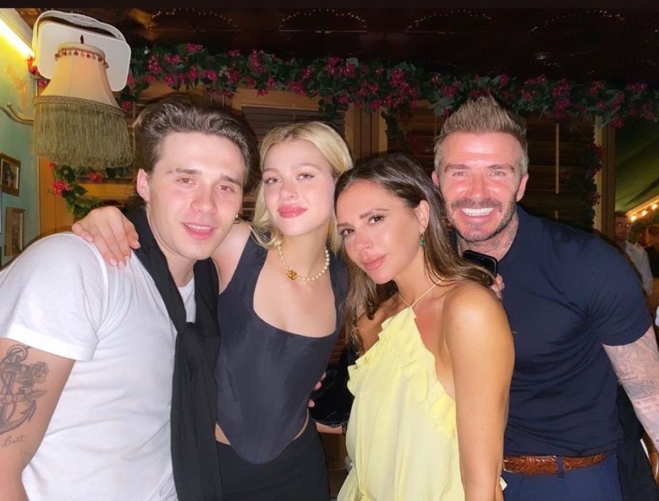 Brooklyn Beckham with his fiancée, Nicola Peltz, and his parents, David and Victoria Beckham.