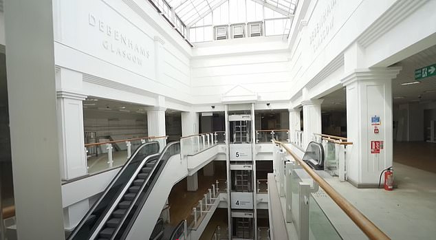 Inside the five-floor shop (pictured this week), the space still has escalators and shop signage