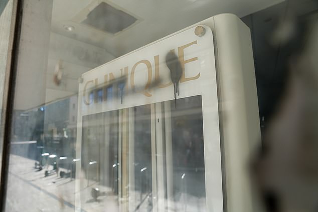 The Clinique sign could still be seen through the graffitied glass of Norwich's Debenhams store