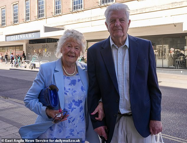 Pictured: John Reynolds, 91, and his partner of 22 years Joy Marriott, 87, outside the former Debenhams store in the centre of Norwich, Norfolk
