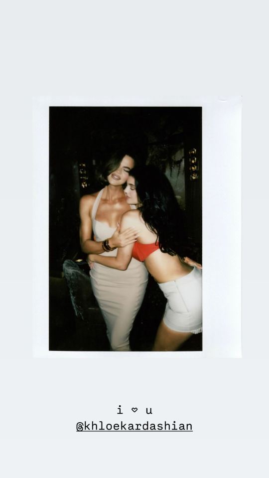 Khloe and Kylie Kardashian embracing.