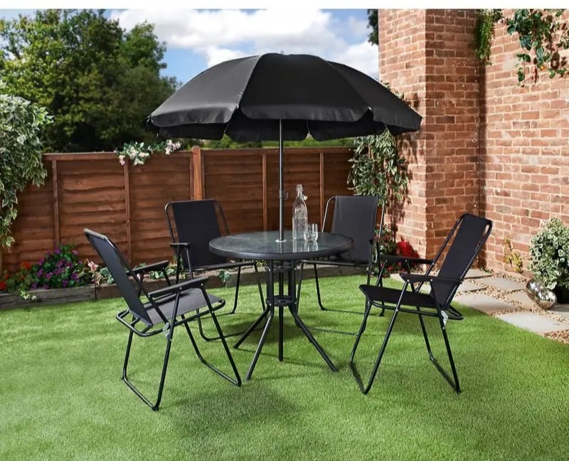 Black patio set with umbrella.