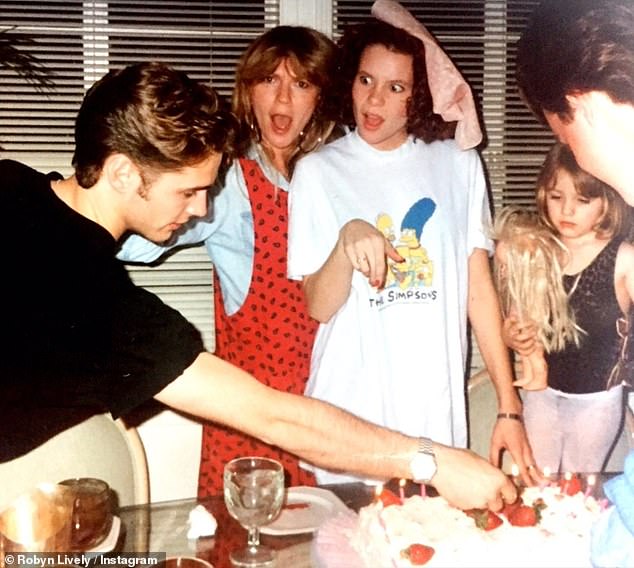 Robyn and Jason are pictured with her mom Elaine and Blake in the 90s
