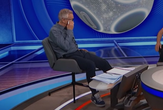Gary Lineker wiping away tears after a tribute on Match of the Day.