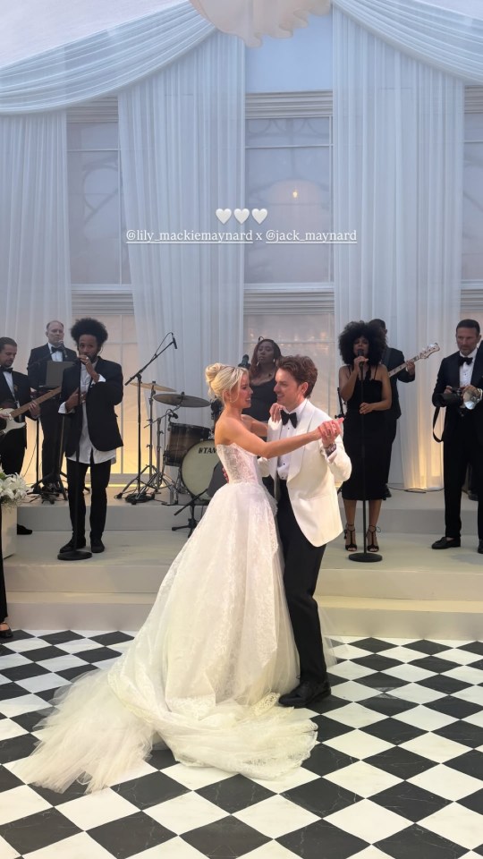 Bride and groom dancing at their wedding reception.