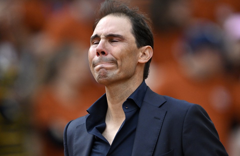 Rafael Nadal appearing emotional at a tribute ceremony.