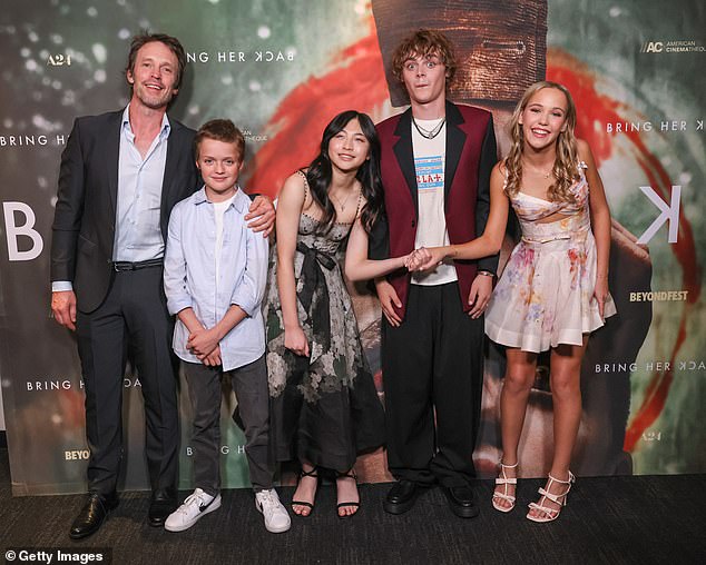 It was Sora (centre) who broke the big news to Mischa (far right) that they'd be heading to Los Angeles for the film's US premiere (pictured), a 'surreal' moment for the young star