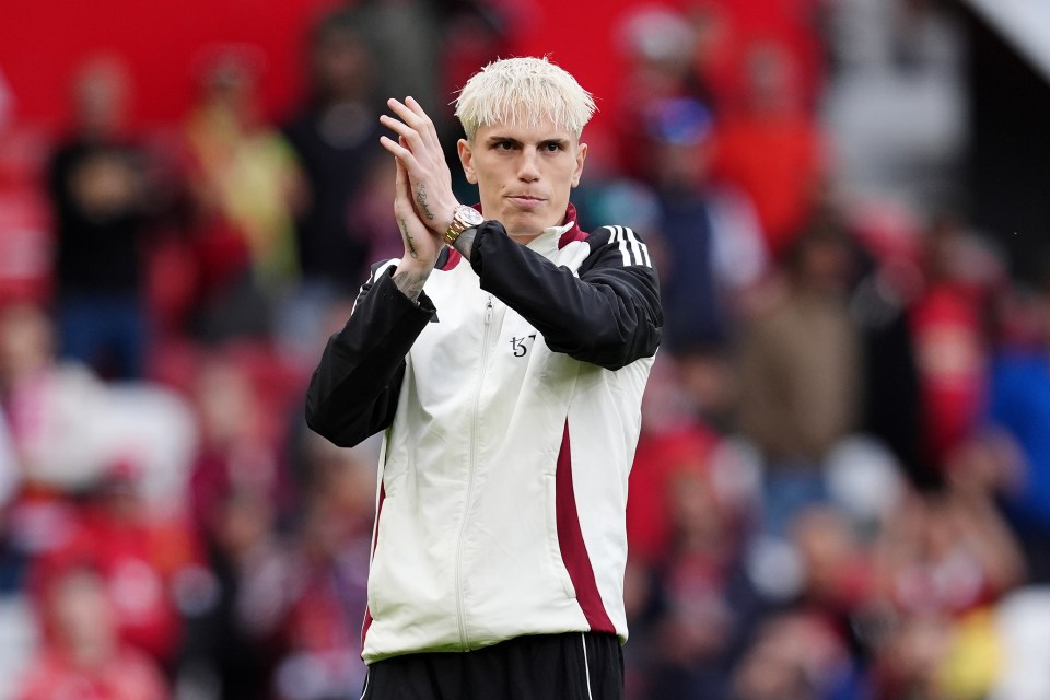 Alejandro Garnacho applauding fans.