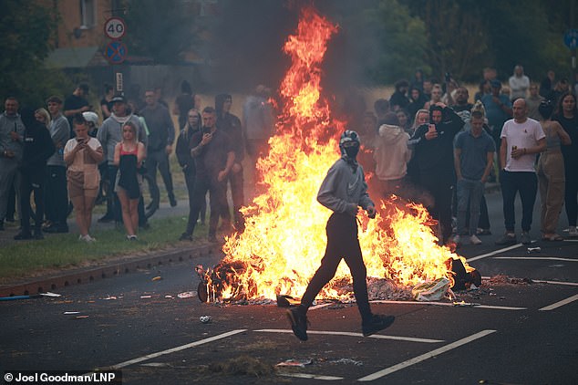 Pictured: Serious violence and rioting by demonstrators broke out on the streets in Rotherham following the Southport attacks