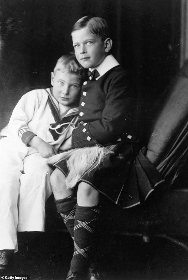 Queen Mary's sons Prince John (left) and Prince George (right) both died before their mother
