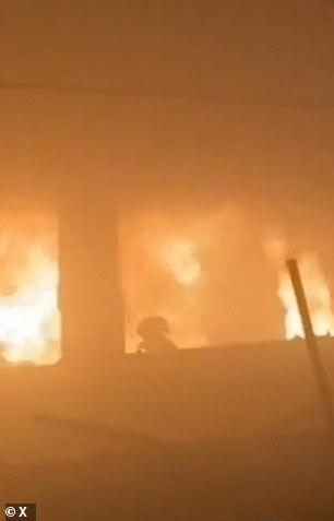 Disturbing footage shared widely online reportedly shows a small child running from the fire after the strike on the Fahmi al-Jarjawi school site