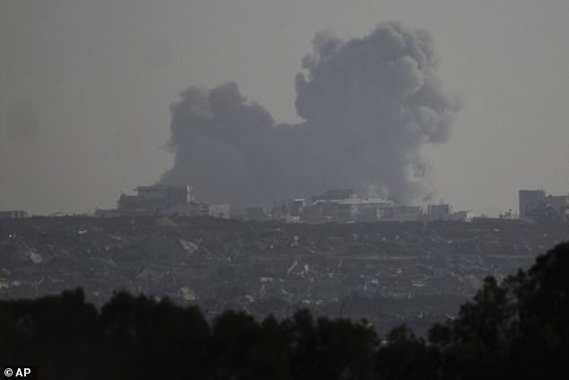 An Israeli bombardment in the Gaza Strip is seen from southern Israel, May 26