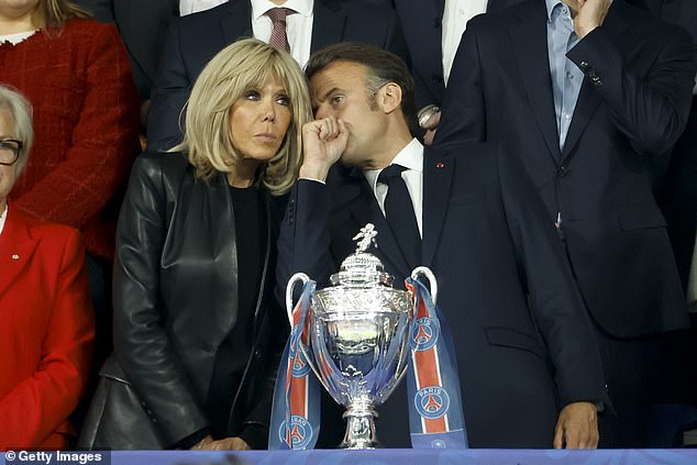 Brigitte and Emmanuel Macron attend the football French Cup Final between Paris Saint-Germain (PSG) and Stade de Reims at Stade de France on May 24