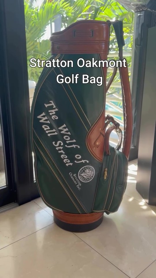 Stratton Oakmont golf bag with "The Wolf of Wall Street" logo.