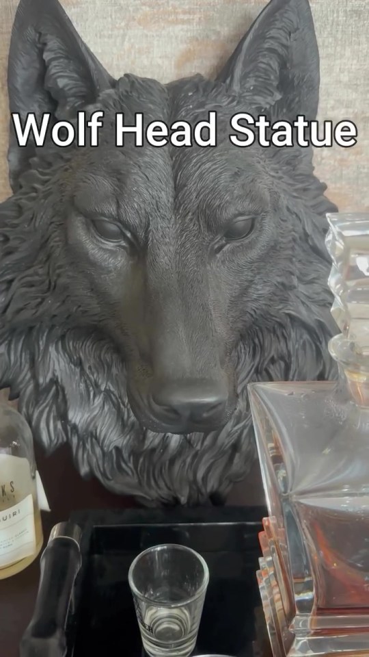 Black wolf head statue.