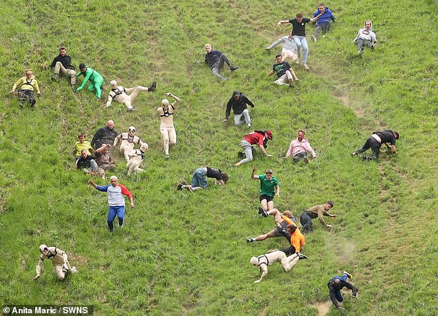 Those left trailing in his wake were seen toppling to the turf as they made their way downhill