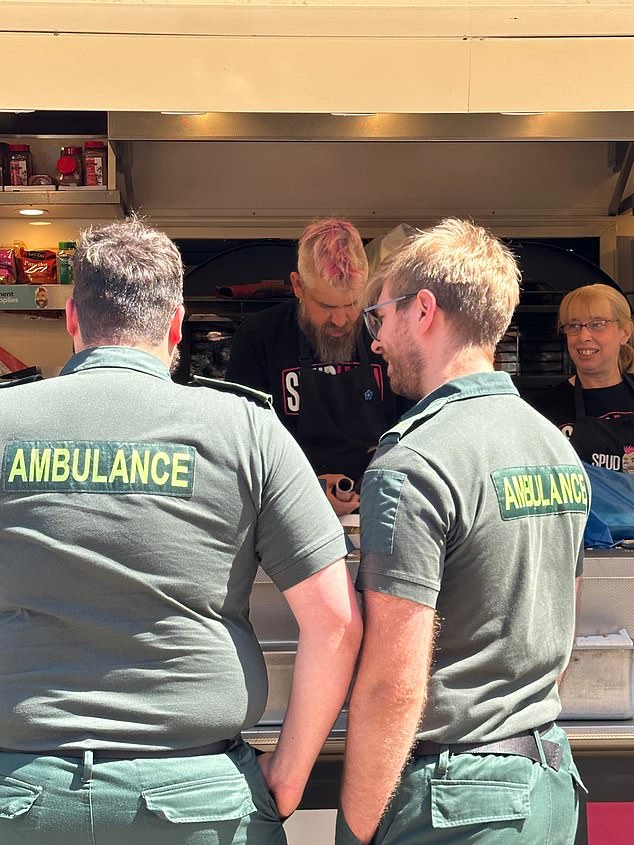Spudman serving two members of the ambulance service. Locals say he donates to many good causes