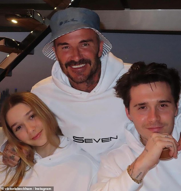 Brooklyn pictured with sister Harper and dad David in 2024