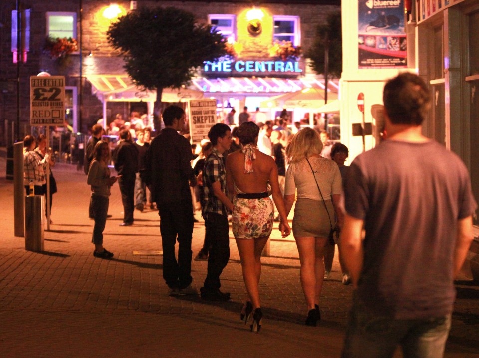 Young people out at night in Newquay.