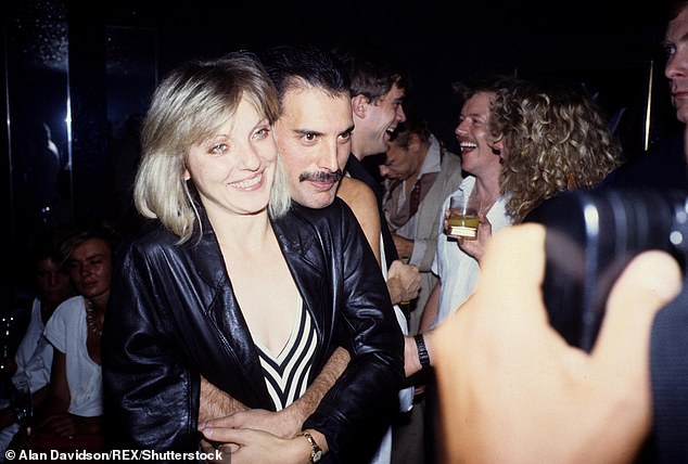 Freddie Mercury is known to have had several relationships with women including Mary Austin - they are pictured here in September 1985