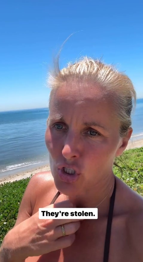 Woman at the beach says, "They're stolen."
