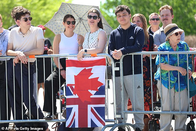 Well wishers look on before the arrival of Britain's King Charles III and Queen Camilla at a Lansdowne Park community event in Ottawa, Canada