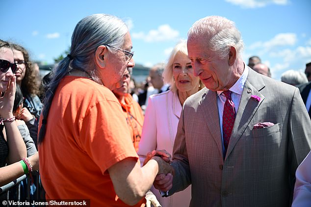 King Charles lll meeting with an elder