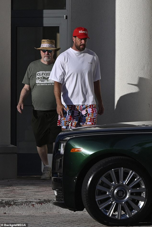 'There is a lot that Taylor has been able to see of the person Travis is by the way he treats family, and she just loves it,' the source said. (Ed and Travis Kelce pictured in May 2025)