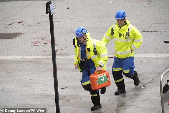 Police and emergency personnel dealing with a road traffic accident on Water Street near the Liver Building in Liverpool after a car collided with pedestrians during the Premier League winners parade. A man has been detained. Picture date: Monday May 26, 2025. PA Photo. See PA story POLICE Liverpool. Photo credit should read: Danny Lawson/PA Wire