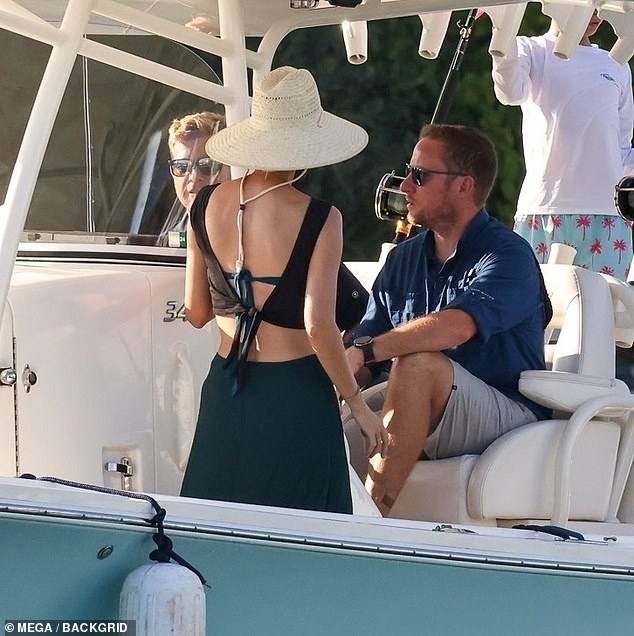 Ivanka donned a green bikini underneath her black crop top